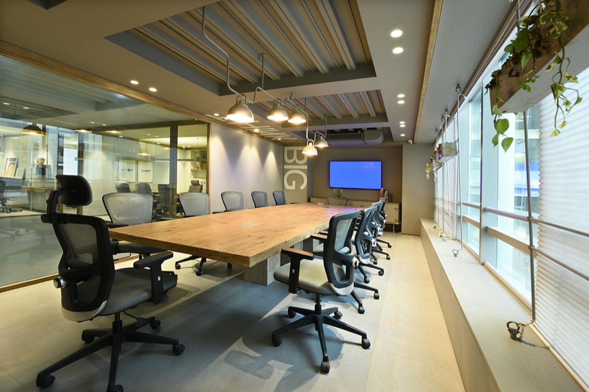 Indian tech conference room with digital screens and whiteboards